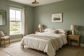 AI-generated bedroom inspiration with soft sage-green walls