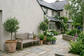 AI-generated courtyard inspiration with pale grey painted rendered wall